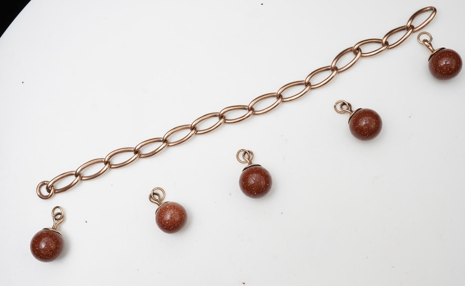 A collection of gold jewels and accessories, early 20th century